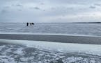 A crack in the ice on Upper Red Lake grew to expose about 30 yards of open water, stranding anglers on a floating piece of ice on Monday, Nov. 28, 202