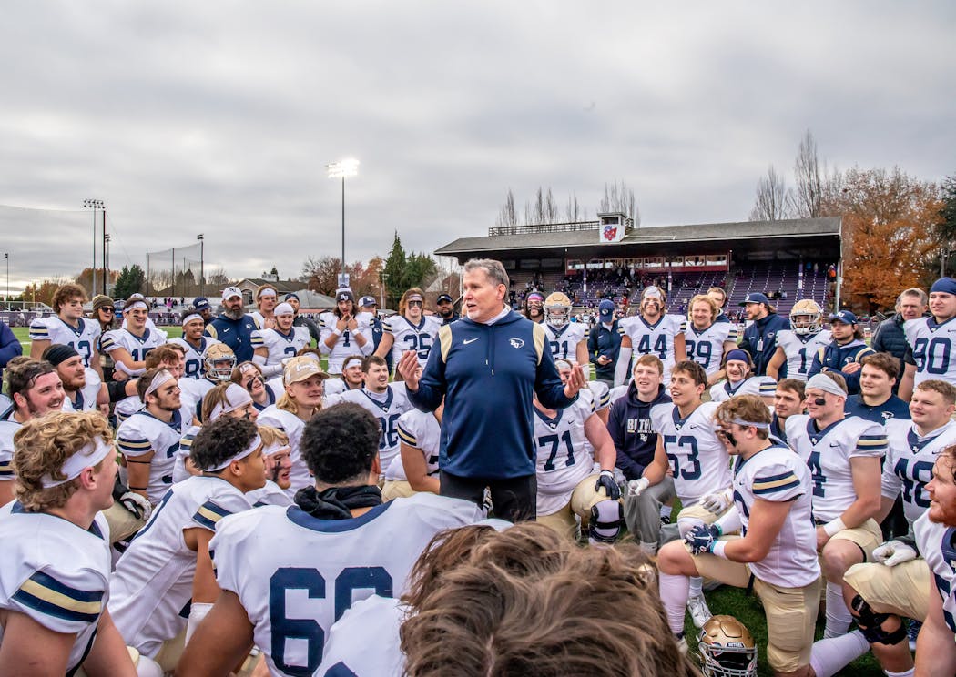 Bethel football coach Steve Johnson addressed his team after their playoff victory Saturday. 