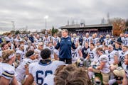 Bethel football coach Steve Johnson addressed his team after a playoff victory last fall.