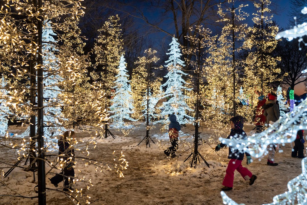 Children ran through the Enchanted Forest at the Glow Holiday Festival at the Minnesota State Fairgrounds in 2021.