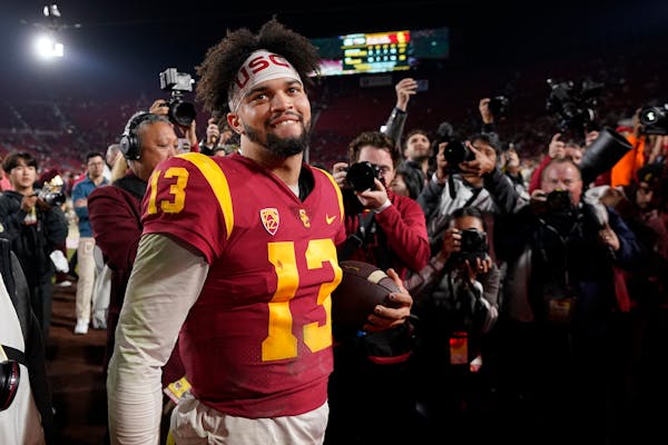 USC quarterback Caleb Williams smiled after the Trojans defeated Notre Dame 38-27 last Saturday in Los Angeles.