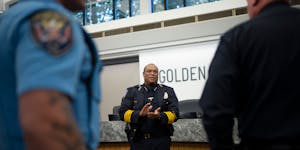 Virgil L. Green Sr. applauded the members of the Golden Valley Police and Fire Departments as they gathered with him for a photo after he was sworn in