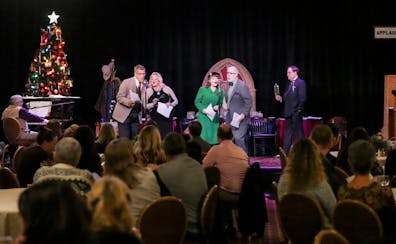 Actors performed in the radio production of “It’s a Wonderful Life” during a private holiday party hosted by Summit Mortgage for its staff Wedne