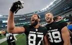 New York Jets tight end C.J. Uzomah (87) and tight end Jeremy Ruckert (89) take a selfie after playing against the Chicago Bears last Sunday.