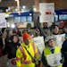 Metro Transit customers rallied outside the transit agency’s Minneapolis headquarters Thursday to protest service cuts.  