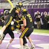 New London-Spicer players celebrate in the end n zone after Brycen Christensen (81)   scored the touchdown to win the 3A title game over Dilworth-Glyn