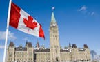 A Canadian Flag flies over Parliament Hill in Ottawa Friday, Feb. 15, 2008.