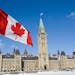 A Canadian Flag flies over Parliament Hill in Ottawa Friday, Feb. 15, 2008.
