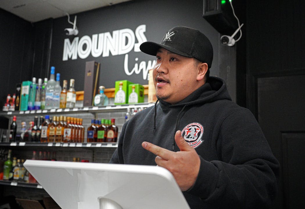 Xia Vang was working at Mounds Liquor on Monday evening when heard gunshots outside.