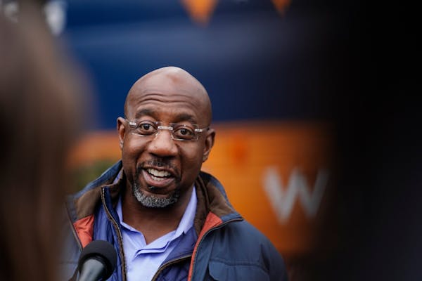 U.S. Sen. Raphael Warnock, D-Ga., who is running for reelection against Republican candidate Herschel Walker in a runoff election, speaks during an el