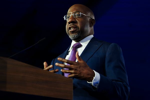 Democratic Sen. Raphael Warnock spoke during an election night watch party, Tuesday, Dec. 6, 2022, in Atlanta. Democratic Sen. Raphael Warnock has def