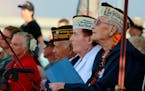 Pearl Harbor survivors and other military veterans observe a ceremony on Wednesday, Dec . 7, 2022 in Pearl Harbor, Hawaii in remembrance of those kill