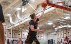 Lakeville North and East Ridge opened the season Tuesday with a matchup ripped from the boys basketball top 10 in Class 4A. Lakeville North, ranked se
