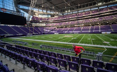 Nicole Powers mopped the floors at the 50-yard-line seats on Wednesday at U.S. Bank Stadium in Minneapolis. She was part of a crew deep-cleaning the s