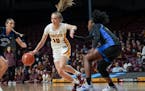 Gophers guard Mara Braun dribbled past Kentucky forward Adebola Adeyeye (25) in the first half at Williams Arena on Wednesday.