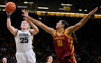 Iowa forward Monika Czinano drove past Iowa State center Stephanie Soares, on her way to supplying 18 points and 10 rebounds as the No. 16 Hawkeyes be