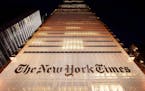 Hundreds of journalists and other employees at The New York Times began a 24-hour walkout Thursday.