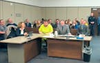 In this image taken from El Paso County District Court video, Anderson Lee Aldrich, 22, center, sits during a court appearance in Colorado Springs, Co