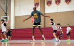 Dennis Evans runs a drill during varsity basketball practice at Hillcrest High School in Riverside, California on December 6, 2022. Evans has recently