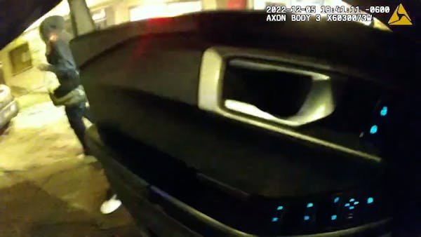 A still image from St. Paul police Sgt. Cody Blanshan’s body camera video shows what appears to be a muzzle flash from the handgun in Howard Johnson