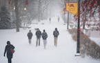 Students made their way across the snowy University of Minnesota campus in Minneapolis in late November.
