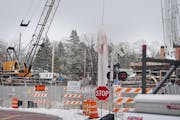 Construction of the Southwest light rail line on Monday along the Kenilworth Corridor in Minneapolis.