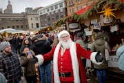 “Ho, Ho, Ho,” shouts out Santa Claus, also known as Paul Hollen as he visits with patrons at the annual European Christmas Market outside the Unio