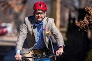 Travis Norvell, pastor at Judson Memorial Baptist Church in Minneapolis, relies on a bike and public transportation. He said sometimes he tells storie
