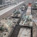 Russian howitzers are loaded onto train cars at a station outside Taganrog, Russia, near the border with Ukraine, on Tuesday, Feb. 22, 2022. A New Yor