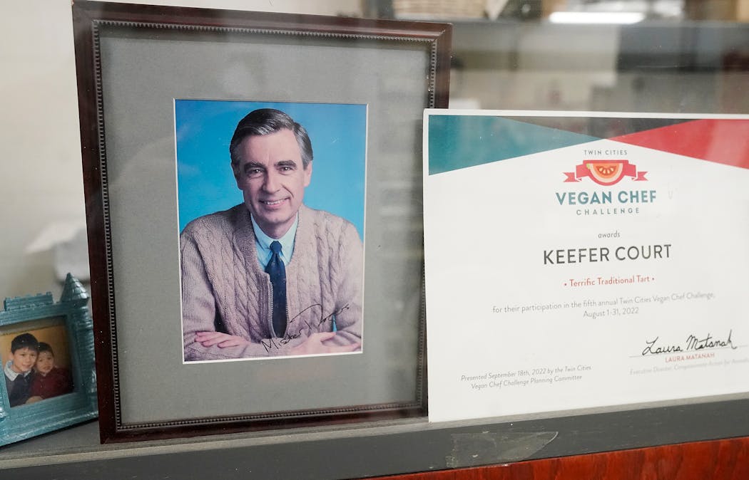 An autographed picture of Fred Rogers is displayed in the Keefer Court office. A crew from “Mister Rogers’ Neighborhood” visited Keefer Court’s fortune cookie factory in Minneapolis for a segment on how fortune cookies are made.