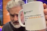KFAN’s Paul Allen shows off a coffee mug he received as a gift that shows a complimentary tweet from LeBron James.