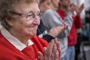 Sister Lois Wedl approved of the action on the basketball court at Claire Lynch Hall earlier this month.