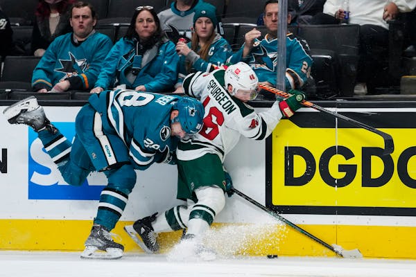 Sharks winger Timo Meier, left, and Wild defenseman Jared Spurgeon collided during the second period Thursday night.