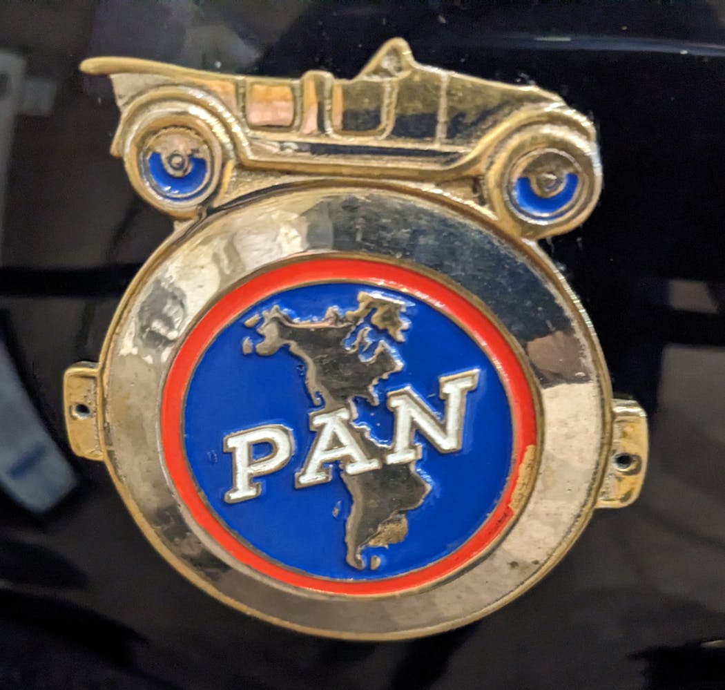 The medallion on the Pan Motor Co. car at Stearns History Museum.