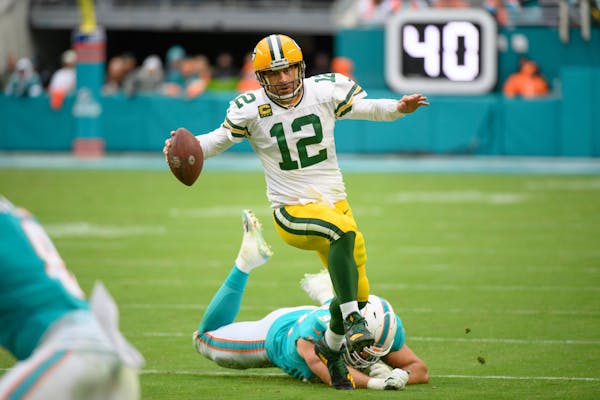 Aaron Rodgers and the Green Bay packers have both a losing record and a chance of making the MFL playoffs if they keep winning and things break the ri