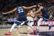 Milwaukee Bucks forward Giannis Antetokounmpo tried to drive against the Wolves when they last played on Nov. 4. The two teams meet again on Friday.