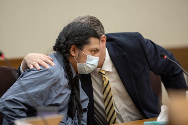 Alfredo Rosario Solis conferred with public defender Matthew Jaimet during his sentencing Tuesday at the Hennepin County Government Center in Minneapo
