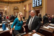 Meteorologists and now Minnesota state senators, Nicole Mitchell and Rob Kupec shared a laugh on their first day of business at the state Capitol.