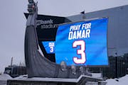 The display outside of U.S. Bank Stadium showed a tribute Wednesday for Buffalo Bills player Damar Hamlin.