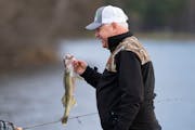 Gov. Tim Walz showed off a walleye during the 2022 Minnesota Governor’s Fishing Opener on May 14 on Lake Winnibigoshish.