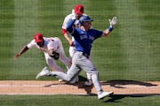 Toronto’s Matt Chapman avoided the tag of Angels pitcher Oliver Ortega during a game in May in Anaheim, Calif.