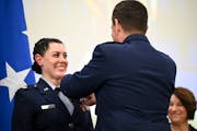 Maj. Katie Lunning of the Minnesota National Guard’s 133rd Airlift Wing was presented with the Distinguished Flying Cross by Lt. General Michael Loh
