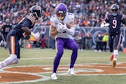 Adam Thielen  of the Vikings caught a touchdown in the first quarter Sunday in Chicago