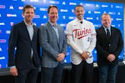 Twins executive chairJoe Pohlad, President of Baseball Operations Derek Falvey, Carlos Correa and Scott Boras at Target Field on Wednesday.