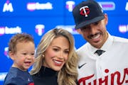 Carlos Correa  and his wife, Daniella, with 1-year-old son Kylo at Target Field on Wednesday. They are expecting again.