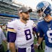 Vikings quarterback Kirk Cousins, left, speaks with Giants quarterback Daniel Jones at the end of a game in 2019.