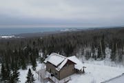 This home on a hill overlooking Grand Marais offers views of Lake Superior and Lutsen Mountains.