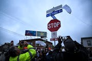 A “George Perry Floyd Square” commemorative street sign was unveiled at 38th and Chicago. FILE PHOTO by Aaron Lavinsky • aaron.lavinsky@startrib