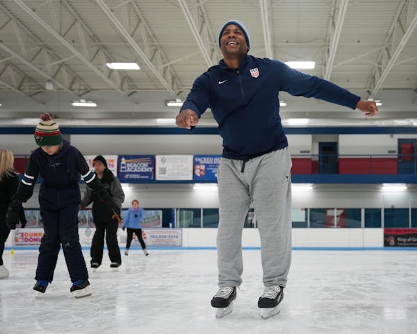 Ryan Hamilton participates in a skating lesson at the ice arena in New Hope, Minn., on Saturday, Jan. 14, 2023. People of all ages learn to skate at N
