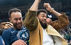 Kyle Anderson and Karl-Anthony Towns celebrated a dunk by Naz Reid during a game last month.